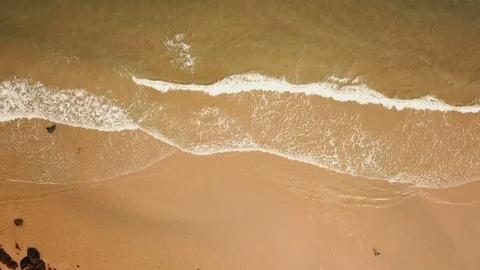 Top View of the ocean waves. Slow Motion aerial 4k  Video. Stock Footage 104773479