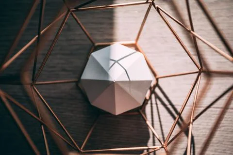 A top view of an octagon geometric shape made of concrete inside a metallic o 스톡 사진