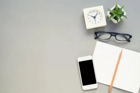 Top view of office desk notebook mobile phone Stock Photos