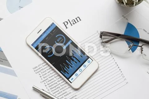 Top view of office desk table with graph chart on mock up Template PSD