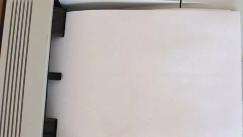 Top view Office laser printer printing on A4 paper Stock Footage 173777160