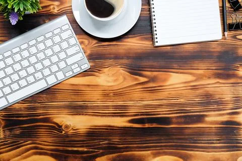 Top view office stuff with notepad, laptop and coffee cup mouse notepad shot. Foto stock