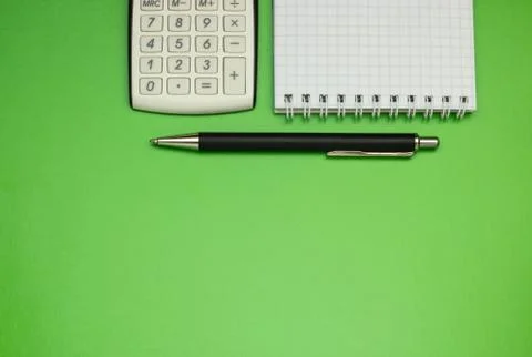 Top view office table calculator with pen on the table for business and copy Stock Photos