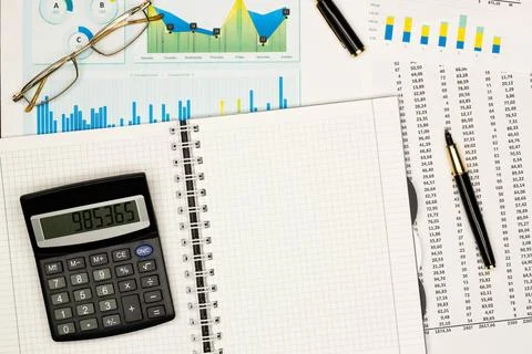 Top view office table desk. Financial report. Flat lay. Workspace with Business Stock Photos