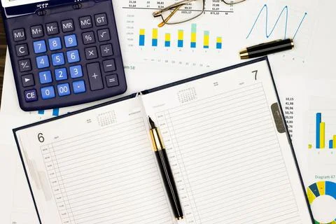 Top view office table desk. Financial report. Flat lay. Workspace with Business Stock Photos