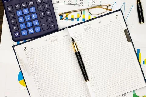 Top view office table desk. Financial report. Flat lay. Workspace with Business Stock Photos