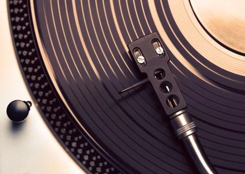 Top view of old fashioned turntable playing a track Stock Photos