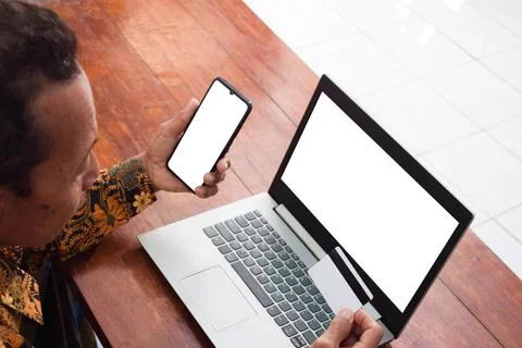 Top view Old man doing financial transaction with the white blank credit card, Stock Photos
