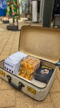 Top view of the old open suitcase with compact discs of Music Albums Bend Swing Stock Photos