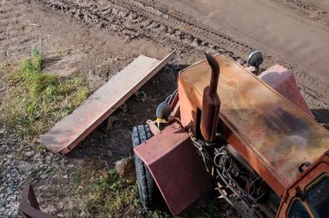 Top view on an old rusting tractor. Stock Photos