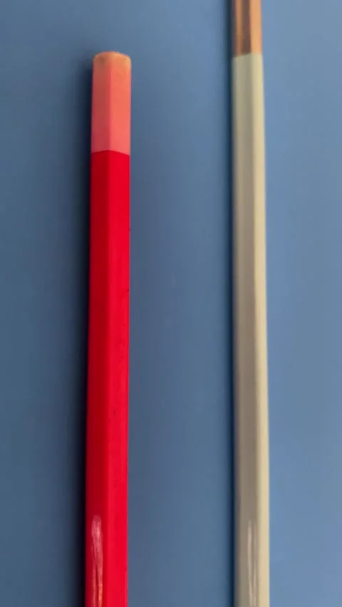 Top View of One Red and One White Pencil Stock Footage 293949087
