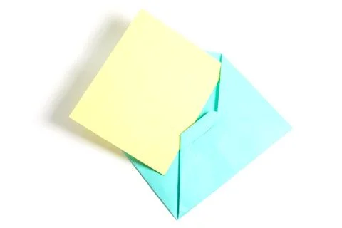 Top view of open blue envelope with yellow paper sheet isolated on white ba.. Stock Photos