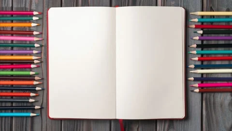 Top view of open empty blank notebook on grey wooden table. Different colored Stock Footage 232342825