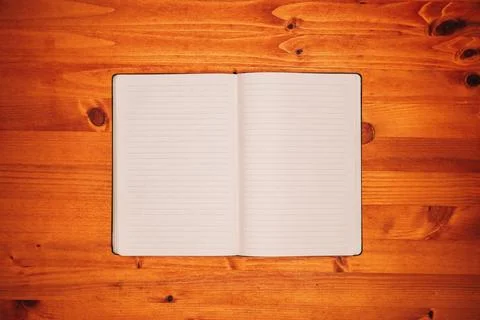 Top view of open empty notebook with lines pattern pages Foto stock