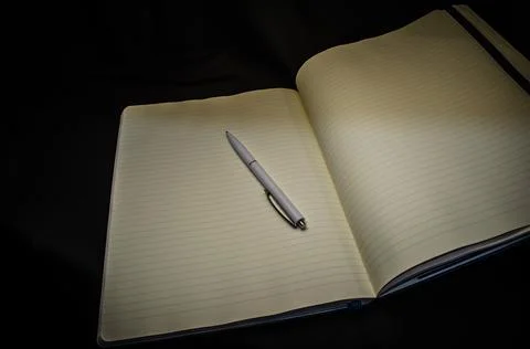 Top view of a open notebook with pen, school notebooks with a spiral spring, Stock Photos