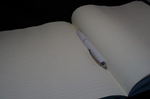 Top view of a open notebook with pen, school notebooks with a spiral spring, Stock Photos