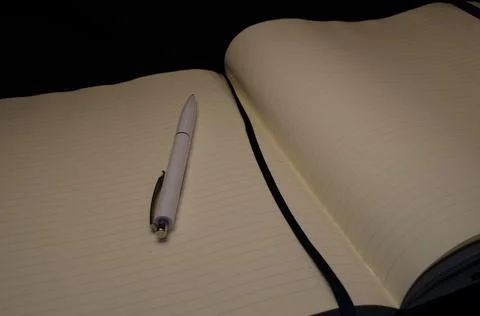Top view of a open notebook with pen, school notebooks with a spiral spring, Stock Photos
