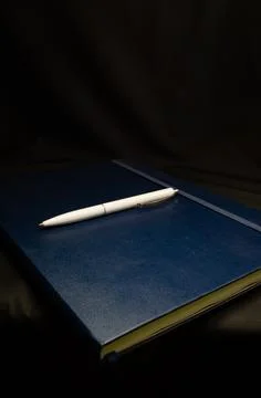 Top view of a open notebook with pen, school notebooks with a spiral spring Stock Photos
