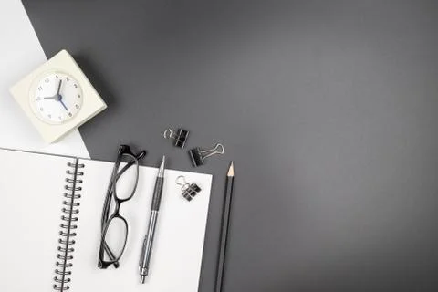 Top view of an open notebook with stationery items Stock Photos