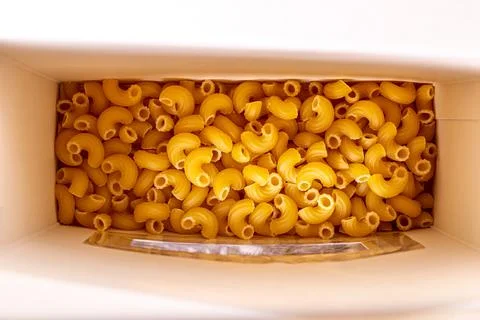 Top view of the open packaging of pasta. Stock Photos