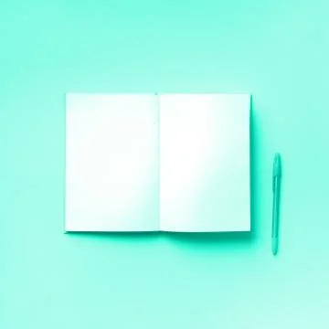 Top view of open pink notebook on trendy mint color background. Copy space Stock Photos