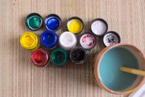 Top view of opened bottles of poster paint Stock Photos