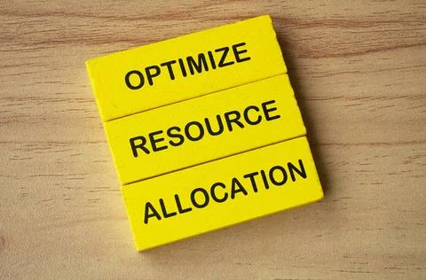 Top view of Optimize Resource Allocation text on yellow wooden blocks. Bus... Stock Photos
