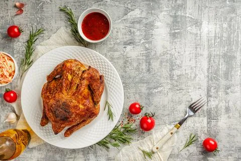 Top view or flat lay of a tasty juicy whole grilled and roasted chicken with Stock Photos