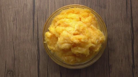 Top view of the orange juice pulp in a g... | Stock Video | Pond5