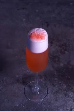 Top view of an orange summer cold cocktail on a gray background Foto stock