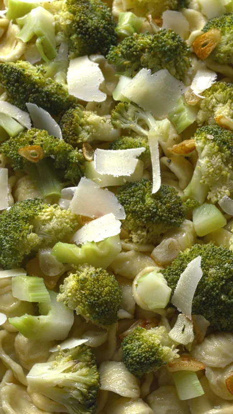Top view of Orecchiette pasta with broccoli. Vertical video. Stock Footage 310795275