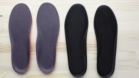 Top view of Orthopedic insoles on table Stock Footage 259449675