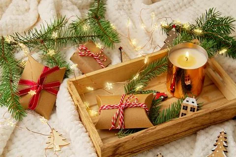Top view over Christmas composition with gifts, xmas tree, candle Stock Photos
