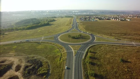Top view over the highway junction. Aerial Drone Flight View of freeway road. Stock-Footage 95472176