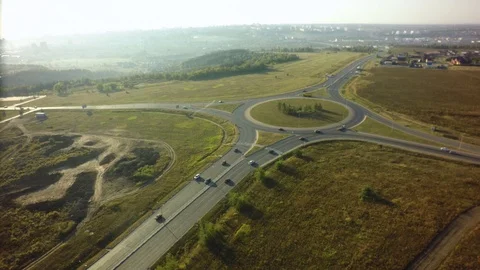 Top view over the highway junction. Aerial Drone Flight View of freeway road. Stock-Footage 95473006