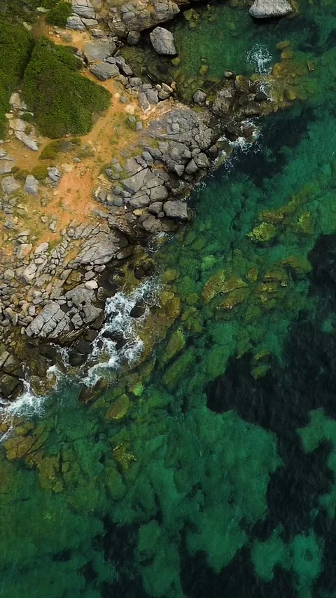 Top view over sea waves crashing on rocky coastline in Greece Stock Footage 342238288