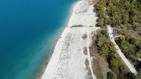 Top view over a turquoise water and white sand beach Stock Footage 113200686