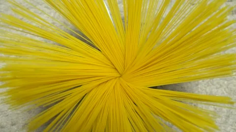 Top view A pack of uncooked spaghetti abstract background of spaghetti pasta rot Stock Footage 246234705