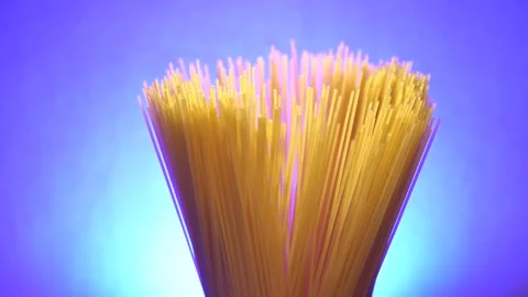 Top view A pack of uncooked spaghetti abstract background of spaghetti pasta rot Stock Footage 246234746