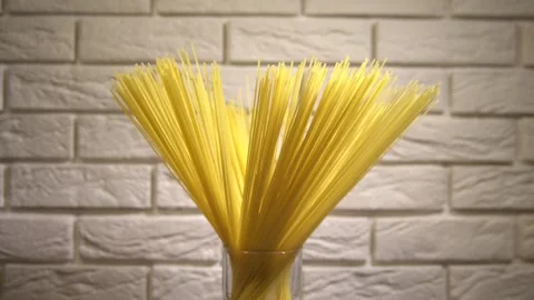 Top view A pack of uncooked spaghetti abstract background of spaghetti pasta Stock Footage 246506012