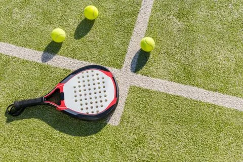 Top view of paddle racket and balls on court Stock Photos