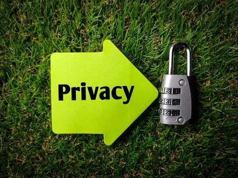 Top view padlock and colored sticky note with text Privacy Stock Photos