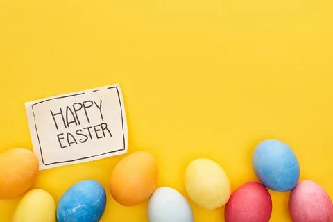 Top view painted eggs greeting Stock Photos