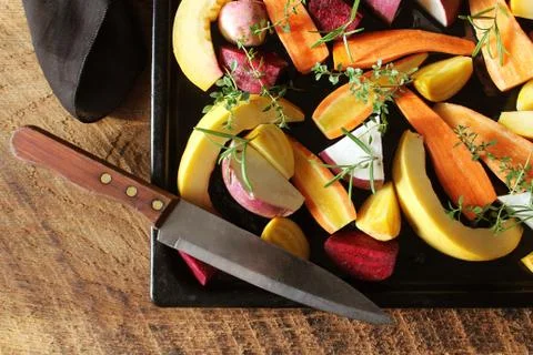 Top view of pan full of fall seasonal vegetables ready to be grilled over a w Stock Photos