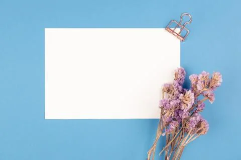 Top view of paper note and purple statice flower in vintage tone Stock Photos