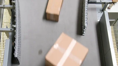 Top view of parcels on a conveyor Stockbeeldmateriaal 80111606