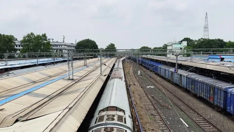 Top view of passenger train departing railway station Stock Footage 340975924