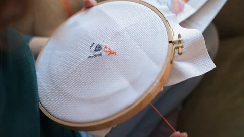 Top view of a pattern that is created using needles and threads Stock Footage 127385475