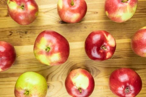 Top view pattern of fresh red apples on rustic wood background Stock Photos