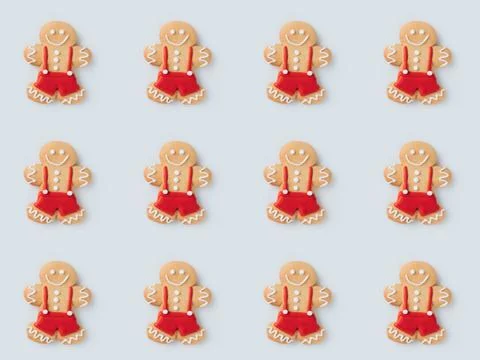 Top view of pattern with Gingerbread men, isolated on white Stock Photos